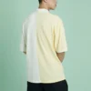 Converse Herren-Poloshirt mit Splicing-Colorblock-Revers und kurzen Ärmeln in Creme-Gelb