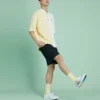 Converse Herren-Poloshirt mit Splicing-Colorblock-Revers und kurzen Ärmeln in Creme-Gelb